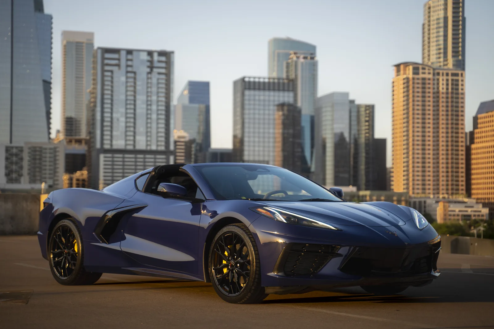 2025 Hysteria Purple Corvette Stingray 2LT front three-quarter downtown Austin